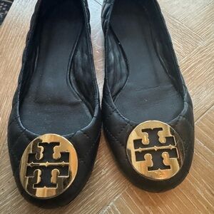 Tory Burch Black Flats with Gold Medallion